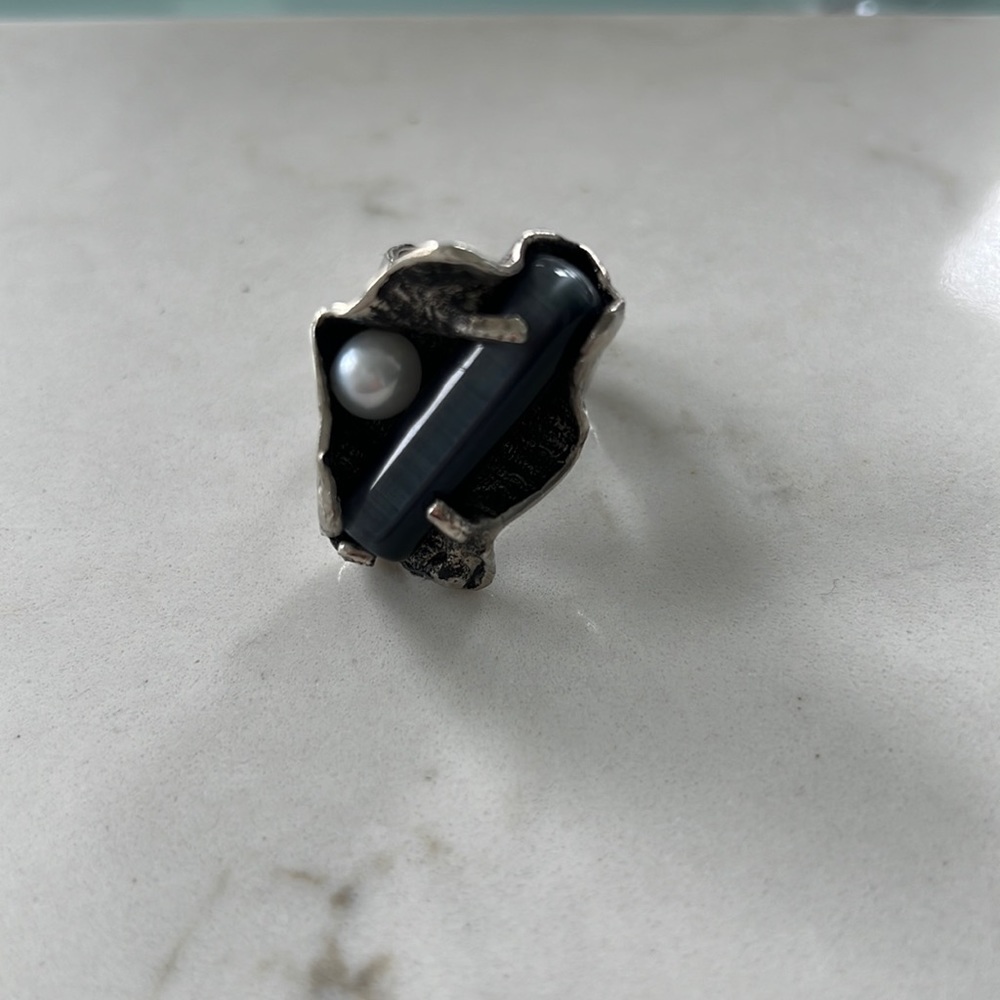 Silver ring with a pearl and grey stone